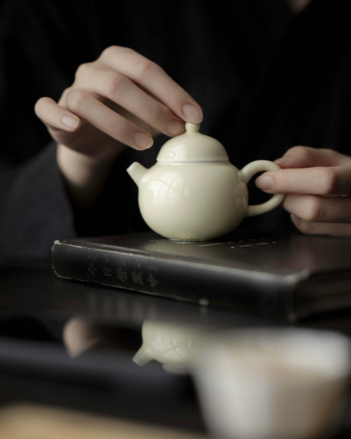 Elegant Ceramic Yellowish White 100ml Chinese Teapot