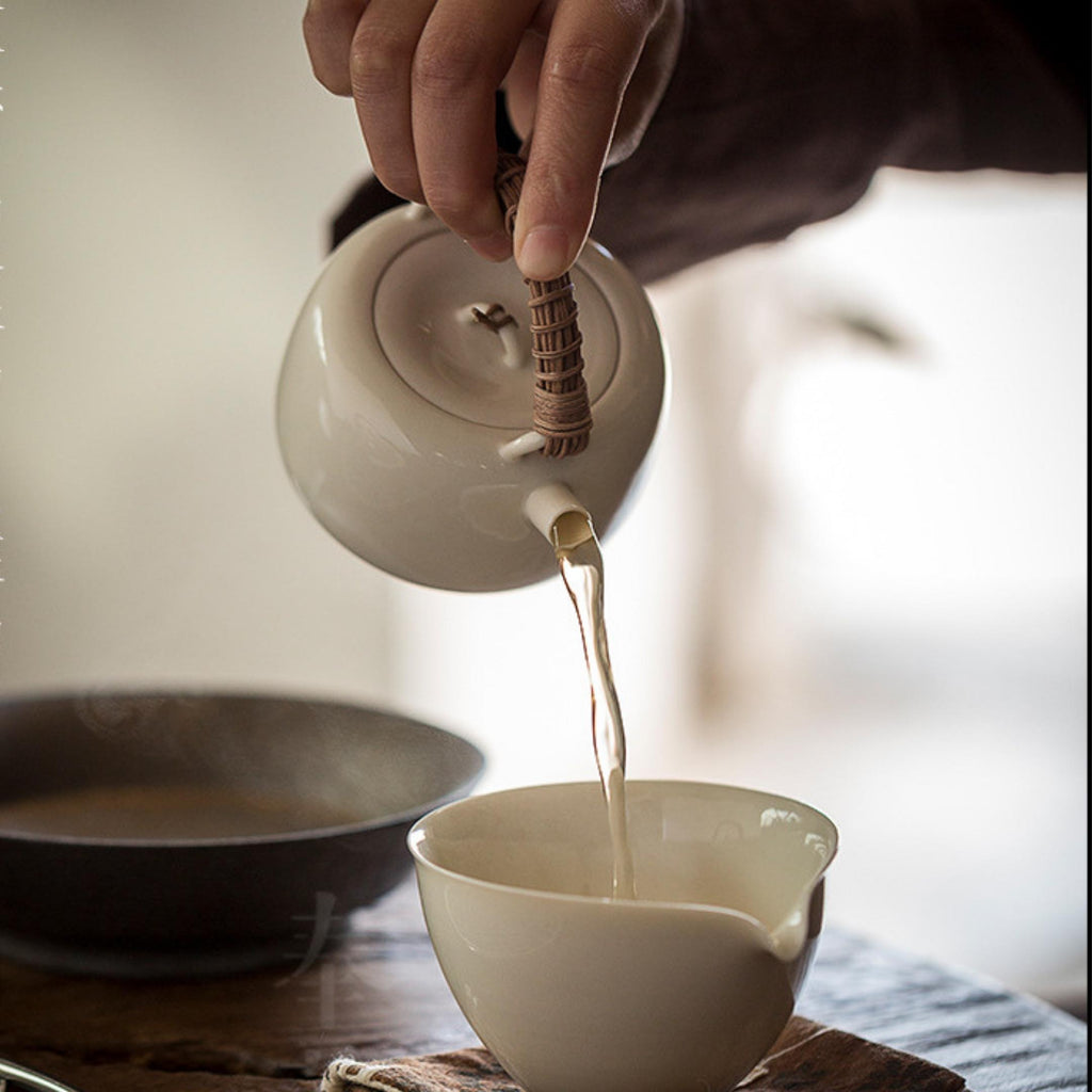 Rattan Handle Milky White Ceramic Kung Fu Teapot