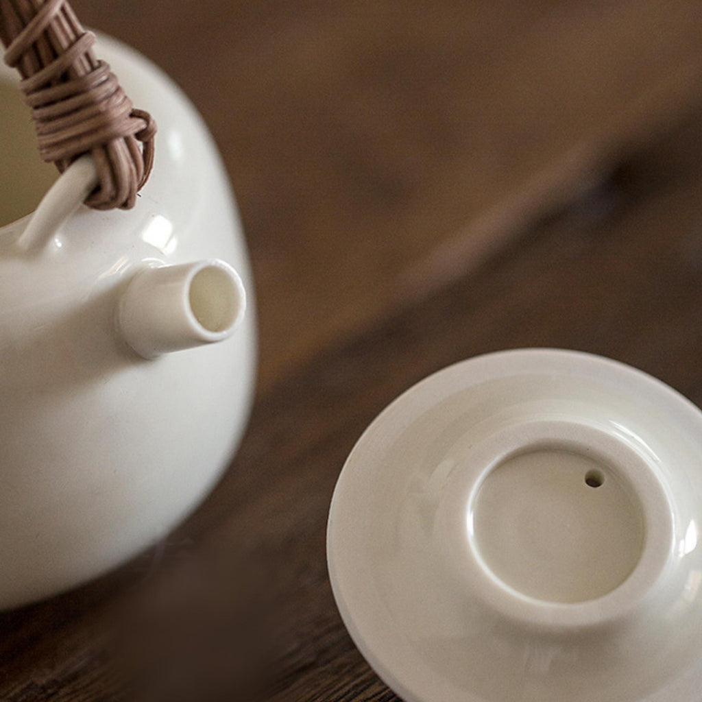 Rattan Handle Milky White Ceramic Kung Fu Teapot
